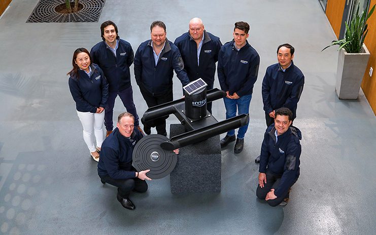 Photo of the team with Hynds Manhole Cover